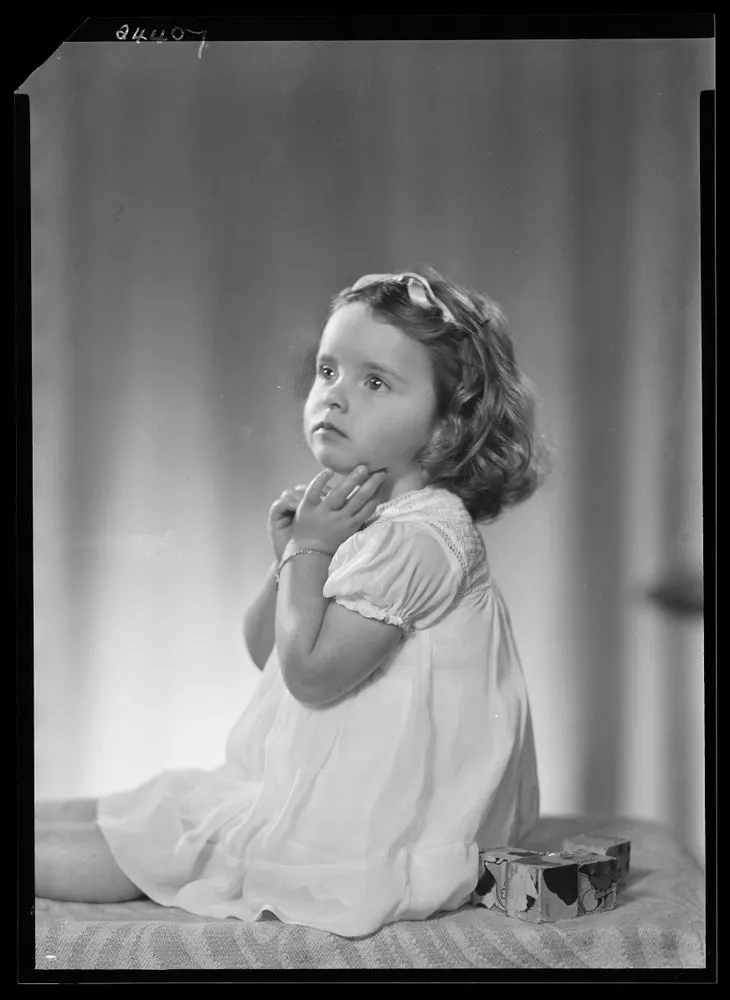 Child; inscribed 'Mrs L V Browne'
