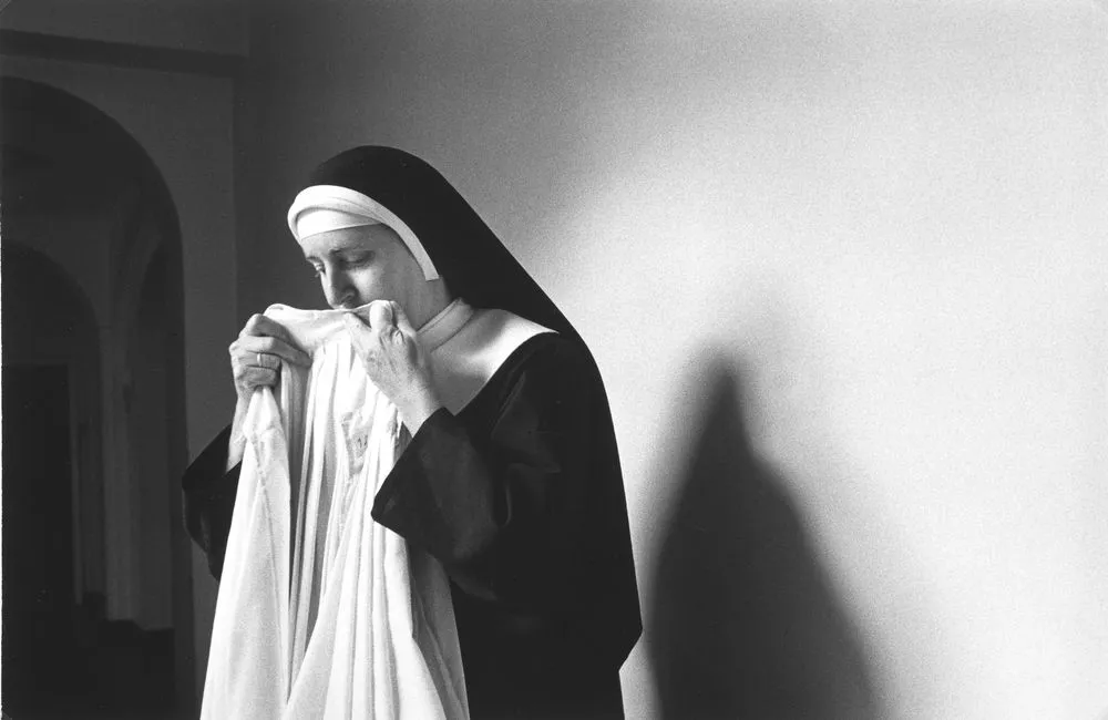Untitled (Nun kissing garment)