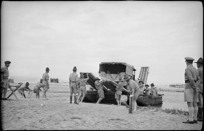 Engineers deploy pontoon raft to ferry truck, Egypt