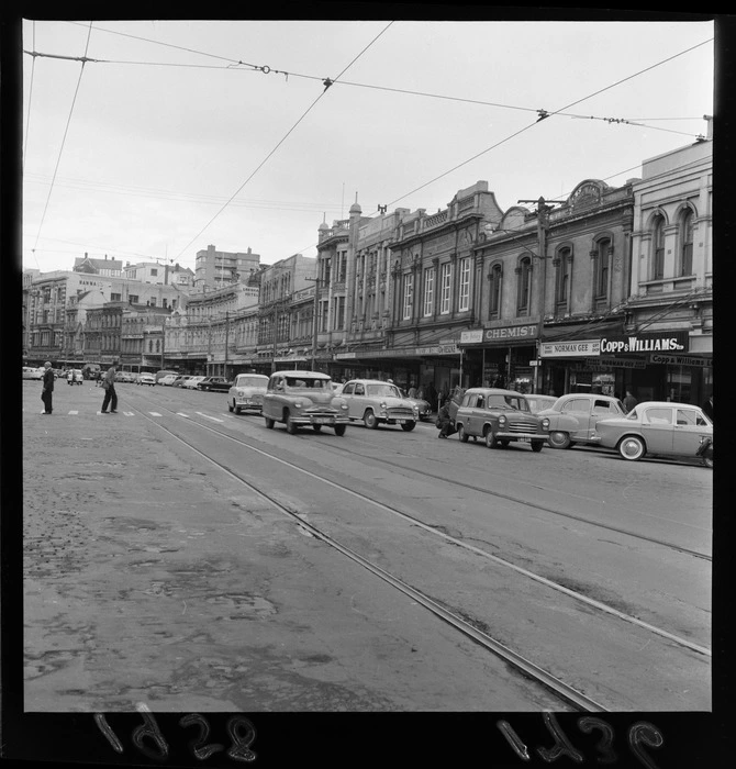 Street view of Lambton Quay, Wellington, including building of Gresham Hotel, Norman Gee gift shop and Copp and Williams Ltd