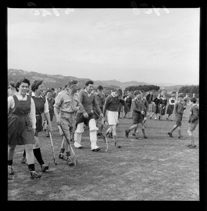 Teachers and students walking onto the field for the Onslow College teacher student hockey match, Wellington