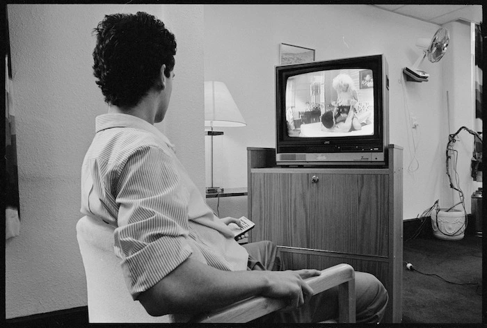 Man watching a pornographic movie - Photograph taken by Phil Reid