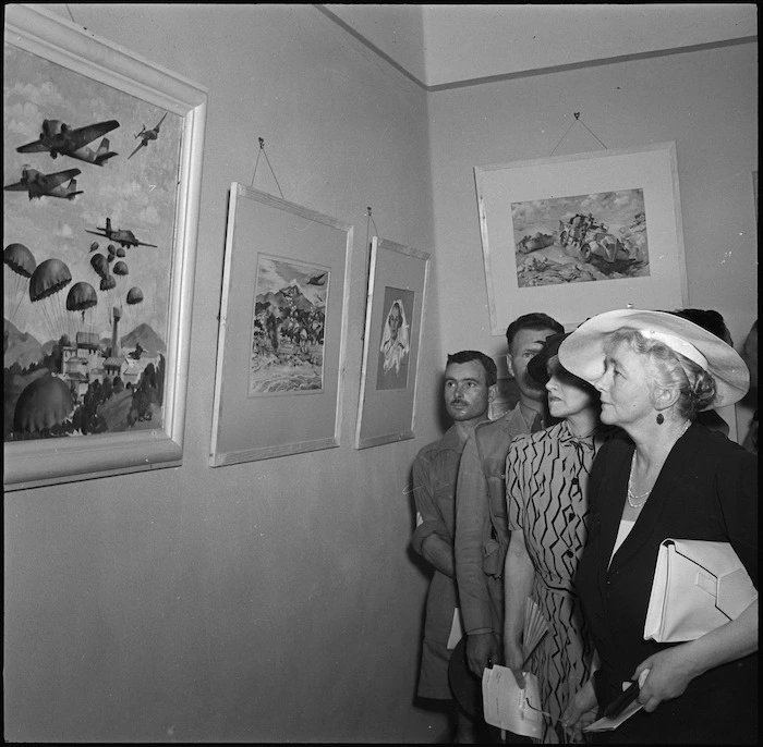 Lady Wavell and others looking at paintings in an exhibition by offical war artist Peter McIntyre, Egypt
