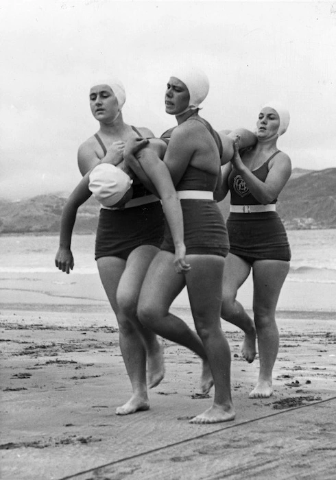 Three women surf life-savers