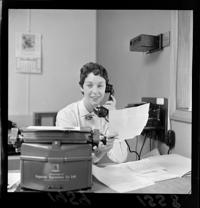 Miss Adele Jansen with typewriter, unknown location