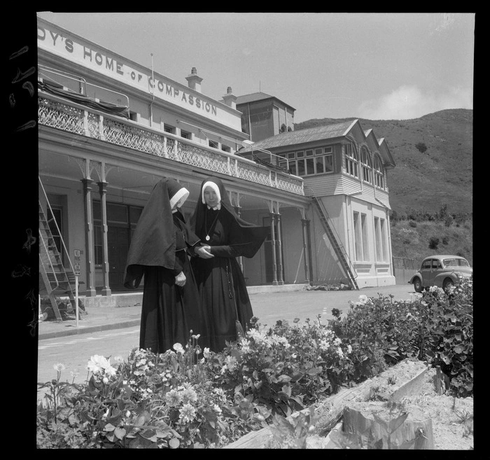 Entrance, Our Lady's Home of Compassion, two nuns in the foreground, Island Bay, Wellington