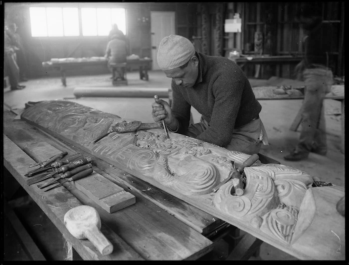 Pine Taiapa working on a wood carving
