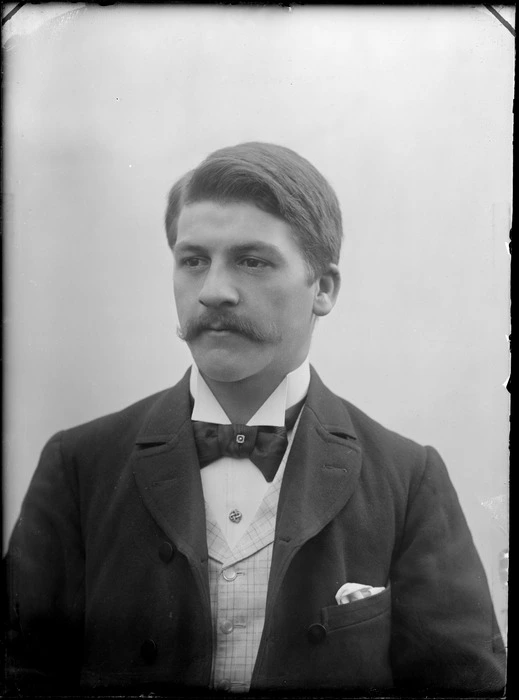 Head and shoulders portrait of unidentified man, with a moustache, wearing a bow tie, probably Christchurch district
