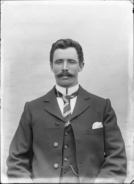 Studio upper torso portrait of unidentified man with a large moustache, imperial shirt collar and patterned tie, Christchurch