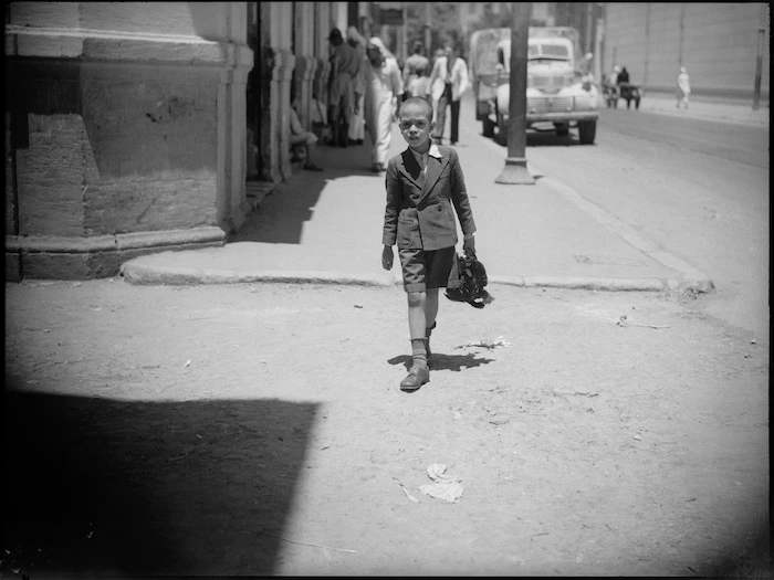 Street scene in Cairo showing local boy - Photograph taken by George Kaye