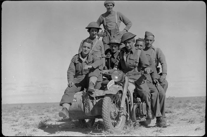 New Zealanders around a captured German motorcycle, World War II