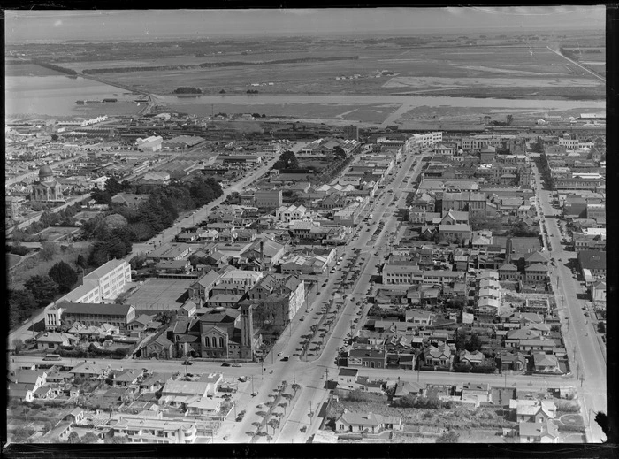 Tay Street, showing First Presbyterian Church (foreground), St Mary's Basilica (centre left) and New River Estuary, Invercargill