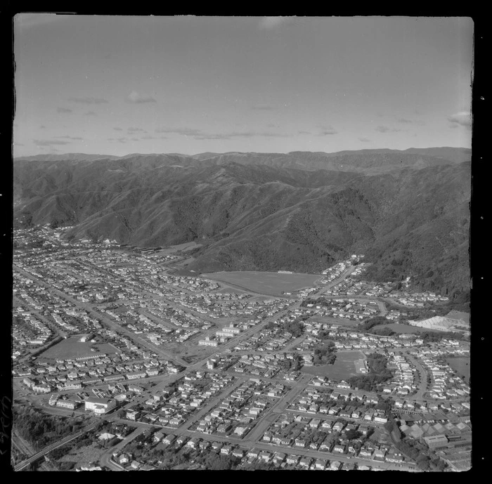 Lower Hutt City and the suburb of Waiwhetu with Whites Line East road and Te Whiti Park, with Waterloo beyond, Hutt Valley, Wellington Region