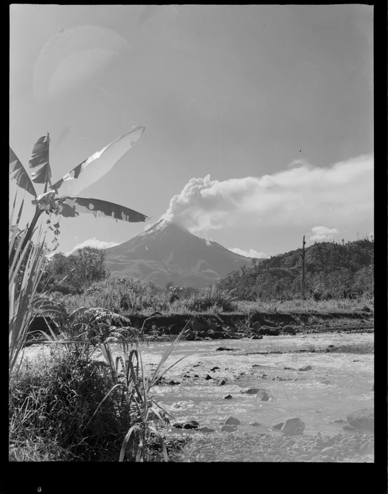 View across a valley stream to the erupting volcano of Mount Bagana, Bougainville Island, North Solomon Island group