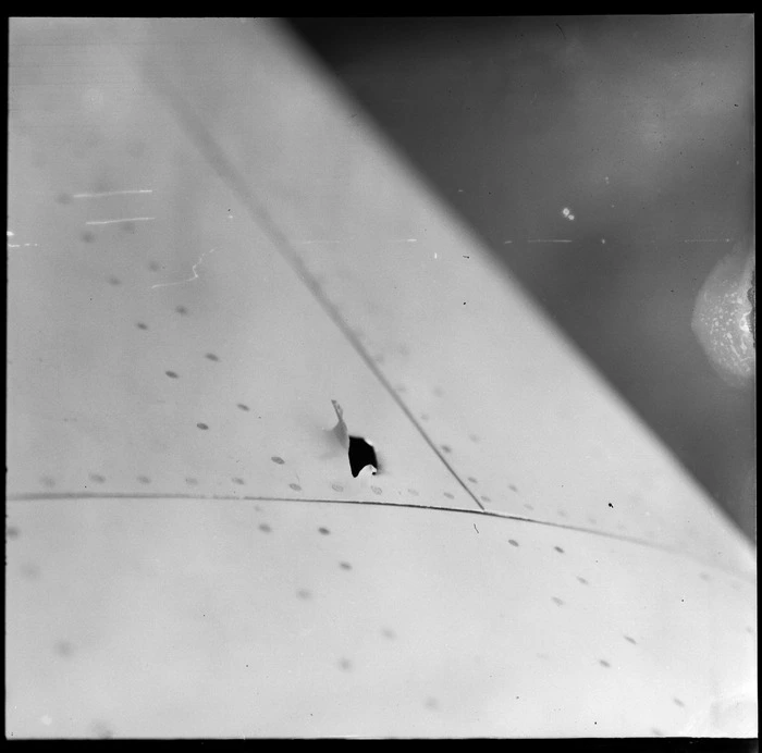 Bullet hole in the wing of Tasman Empire Airways Ltd Short S 30 Empire flying boat 'Awarua', made by a United States fighter plane