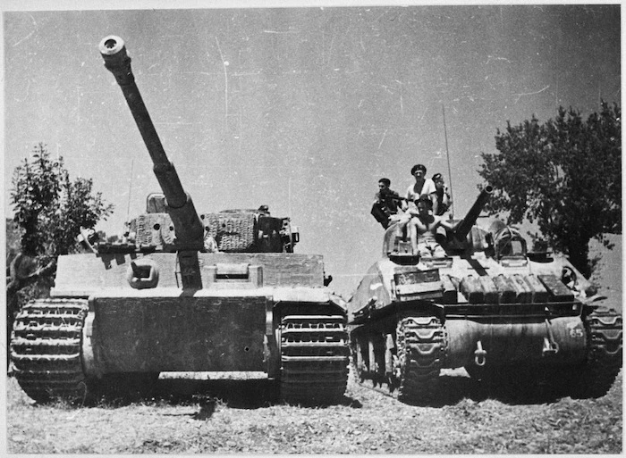 New Zealand Sherman tank alonside a German Tiger tank in La Romola, Italy, World War II - Photograph taken by George Kaye