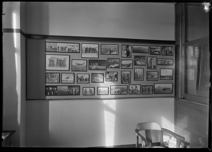 Interior display of historic photos of aircrafts and staff at Whites Aviation office, Dilworth Buildings