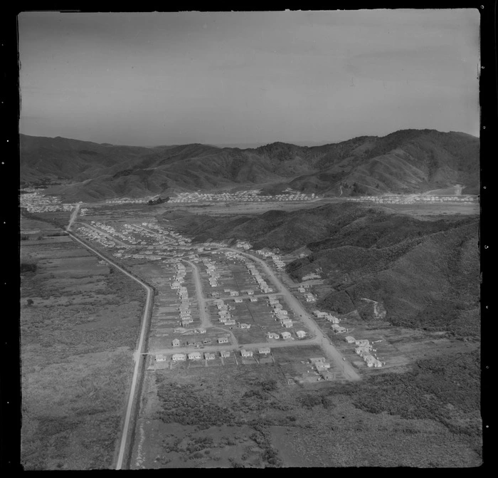 View east to the Lower Hutt Valley suburb of Wainuiomata with the Wainuiomata Hill Road in the foreground, Wellington City