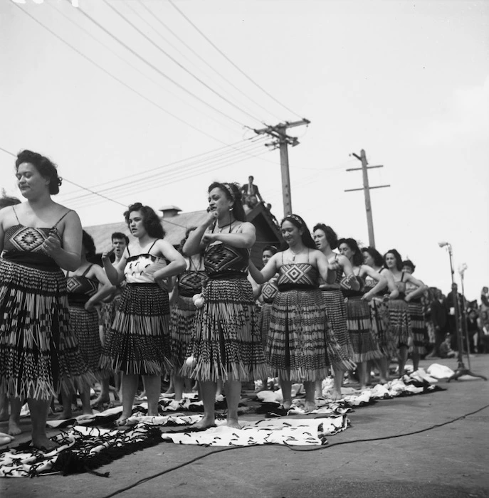 Members of the Ngati-Poneke club performing for the Maori Battalion on their return to New Zealand