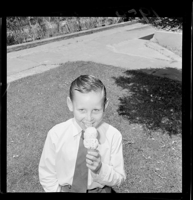 Earle Doidge, a young boy eating an icecream