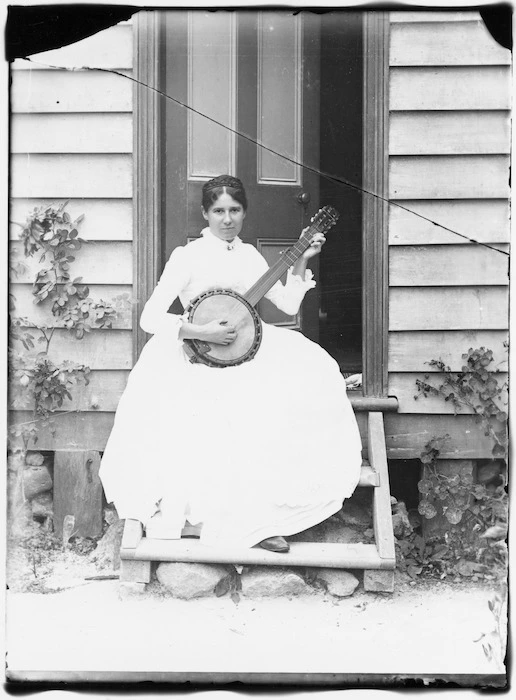 Lydia Williams with her banjo, Carlyle Street, Napier