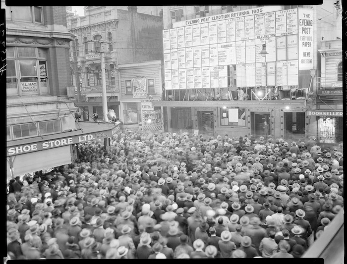 Election night crowds outside the Evening Post building, Willis Street, Wellington