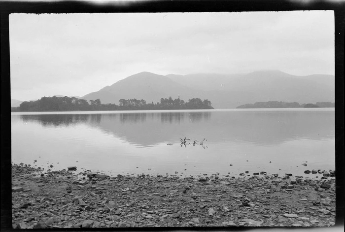 Lake scene, including trees and mountain in background, Killarney, County Kerry, Ireland