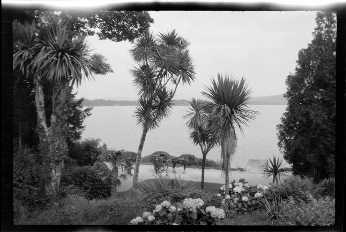 View of Dinis Cottage garden and Lake Muckross, Killarney, County Kerry, Ireland