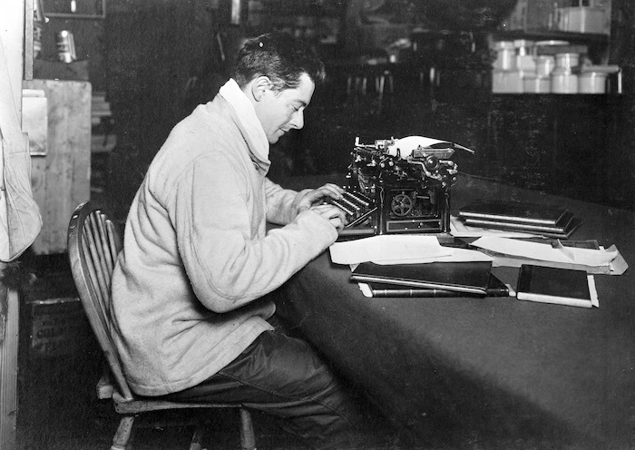 Cherry-Garrard at his typewriter, Antarctica