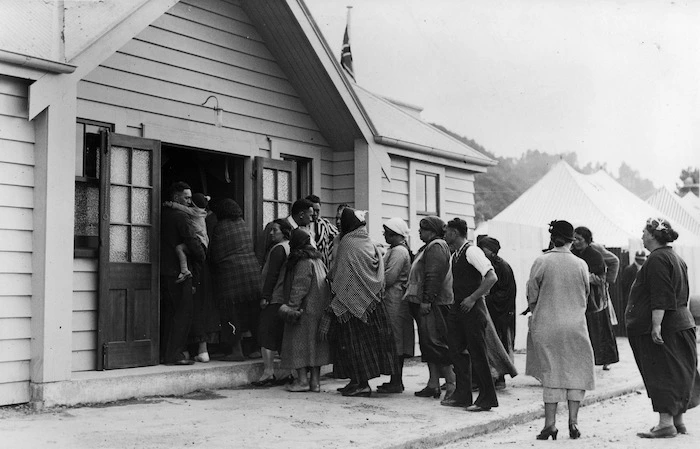 A queue of people entering the Petone Meeting House in the Hutt Road