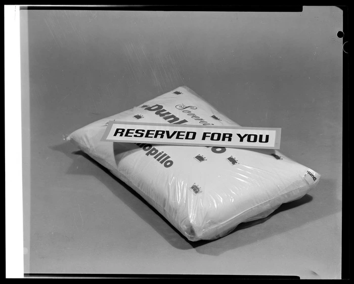 Pillow with 'Reserved for you' sign on top