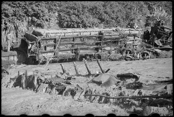 Wrecked railway carriages on the banks of the Whangaehu Stream at the scene of the railway disaster at Tangiwai