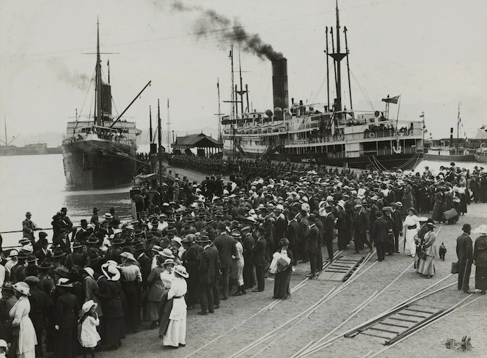 Weekly Press, 1865-1928 (Newspaper) : Lyttelton wharf showing troopships and a crowd farewelling World War 1 troops