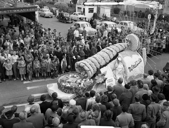 Wattie's float in the Hastings Blossom Festival parade and some of the crowd watching the parade