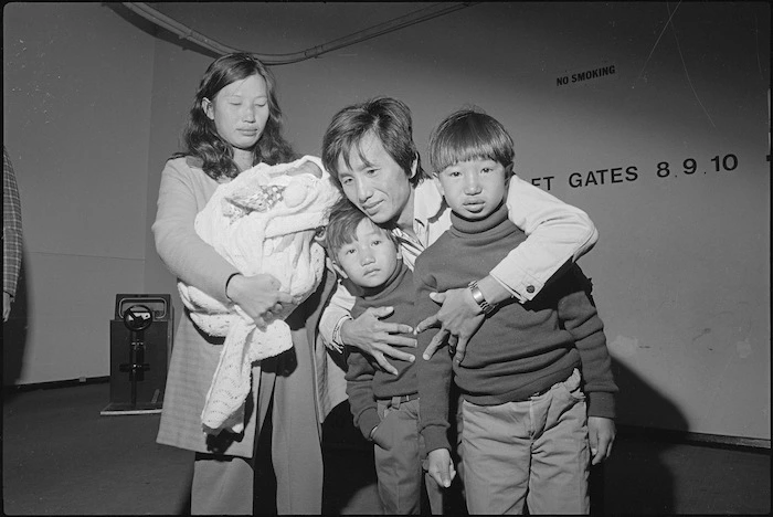 Cambodians Tan Ten Lian and Lauv Muy Fang are reunited with their children at Wellington Airport - Photograph taken by Ian Mackley