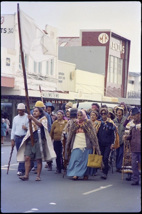 Tame Iti holding pou whenua, accompanied by Whina Cooper, leading Maori Land March along Hamilton street