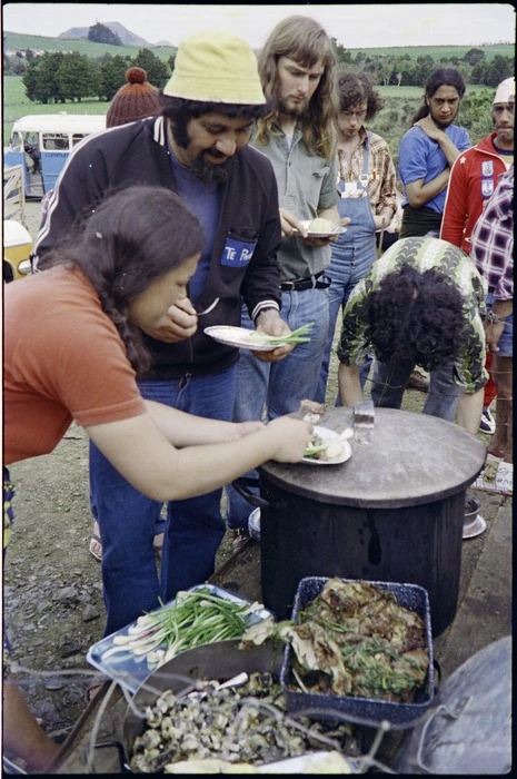 Participants in Maori Land March, including Lyn Doherty, Dave Clarke, and Vivian Hutchinson, line up for food at Whakapapa Picnic, Whangarei