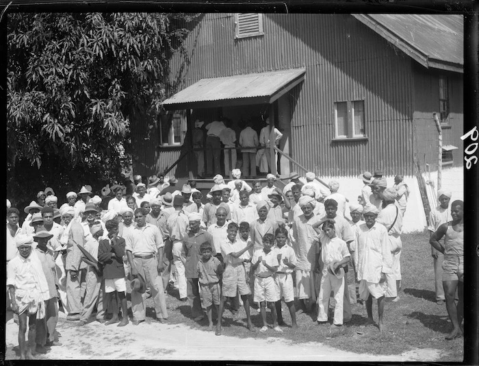 Fijian Indian farmers and boys, Fiji