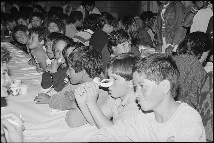 Young Te Teko children waiting for their dinner at Hahura Marae, Onepu - Photograph taken by John Nicholson