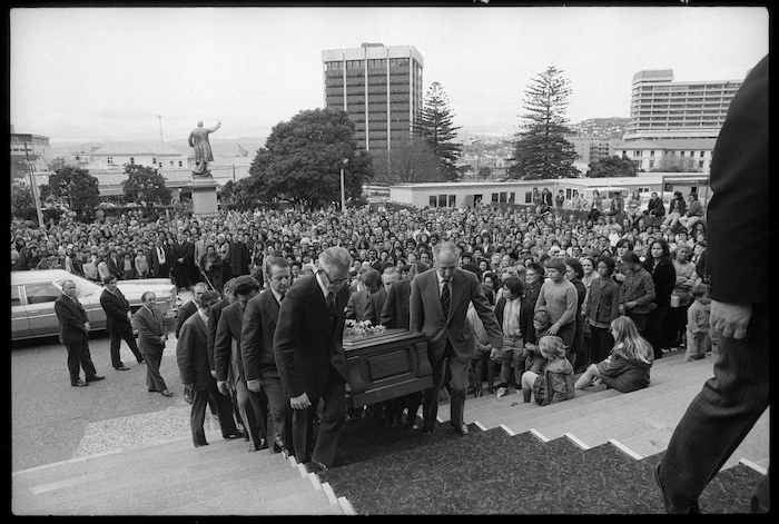 Prime Minister Norman Kirk's coffin being carried up the steps of Parliament