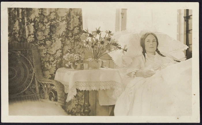Photographer unknown :Photograph of woman in bed