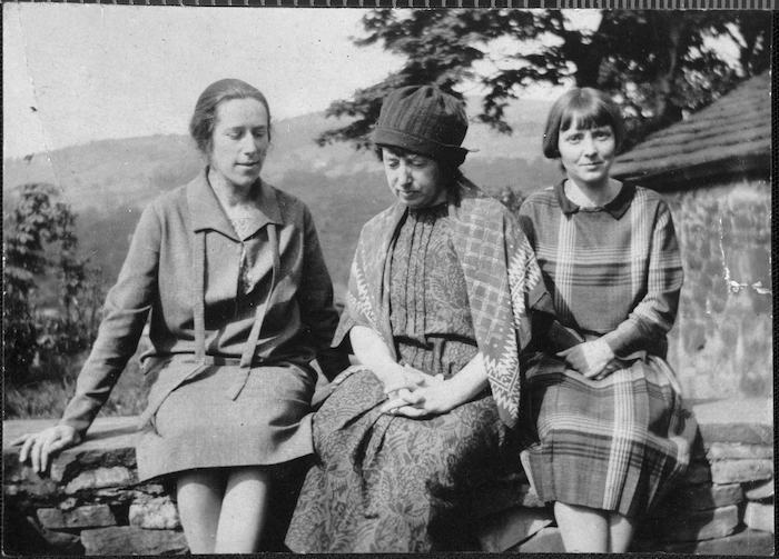 Hannah Richie, Frances Hodgkins, and Jane Saunders seated in a garden.