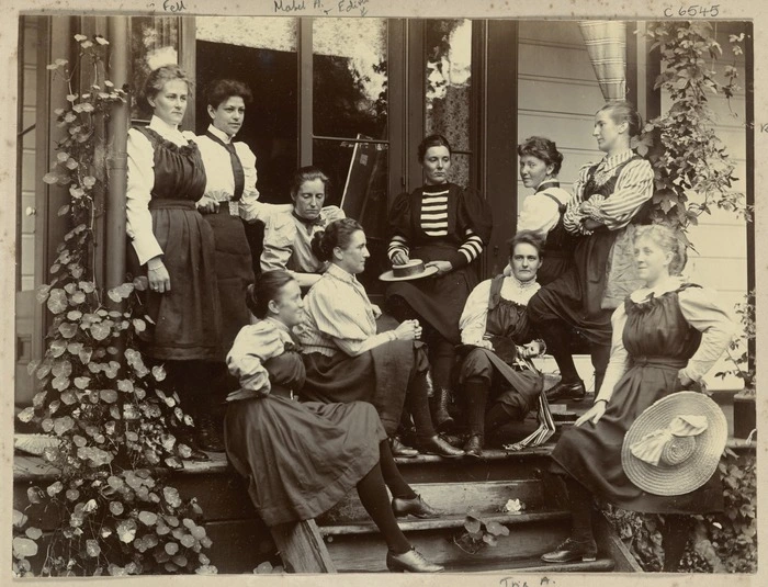 Young women grouped on a veranda