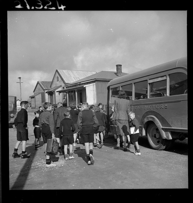 Children boarding the school bus in Denniston