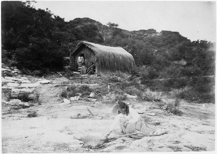 Guide Sophia Hinerangi cooking at Te Tekapo Flat, Rotomahana, Rotorua district