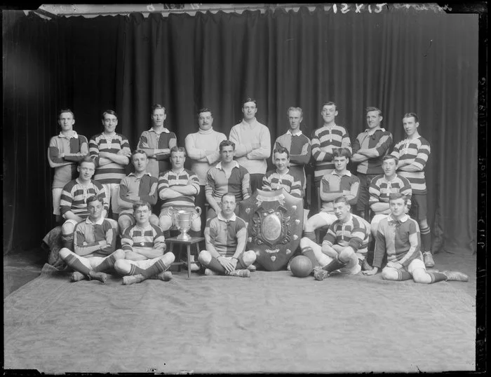 Sydenham soccer team with trophies, Christchurch