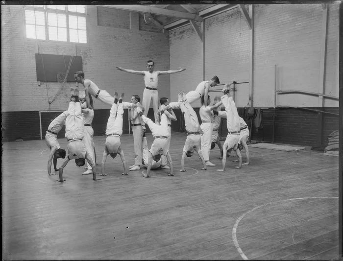 Young Men's Christian Association gymnastics demonstration in a gymnasium