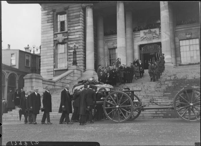 Coffin being loaded onto gun carriage, Parliament Buildings, Wellington
