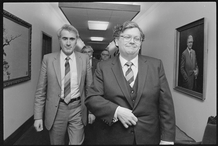 David Lange and Geoffrey Palmer leaving the Labour caucus after the election of the cabinet - Photograph taken by Ross Giblin
