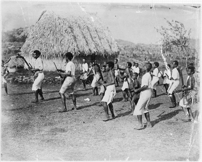 Boys learning meke ivau (club dance), Fiji